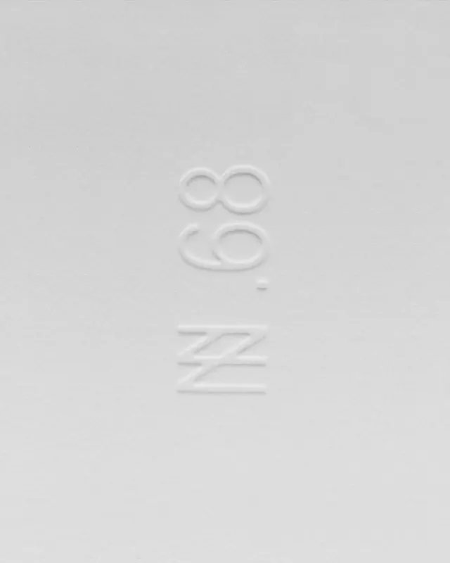 Embossed Logo Detail, minimal, luxury, monochrome