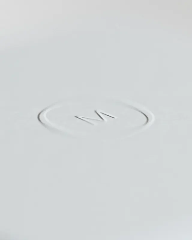 Embossed Logo Detail, minimal, luxury, monochrome
