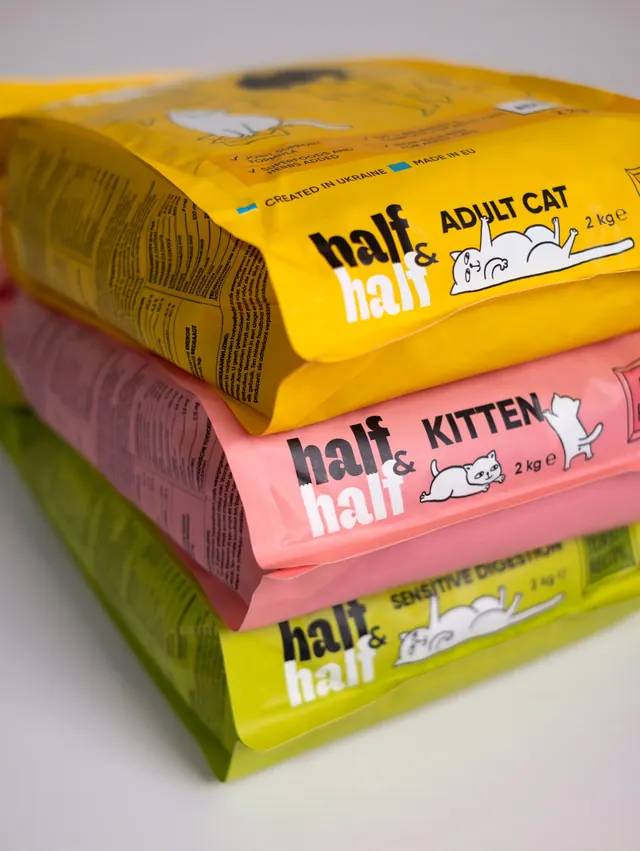 Half and Half cat food pouches stacked, photographic, illustrated, vibrant
