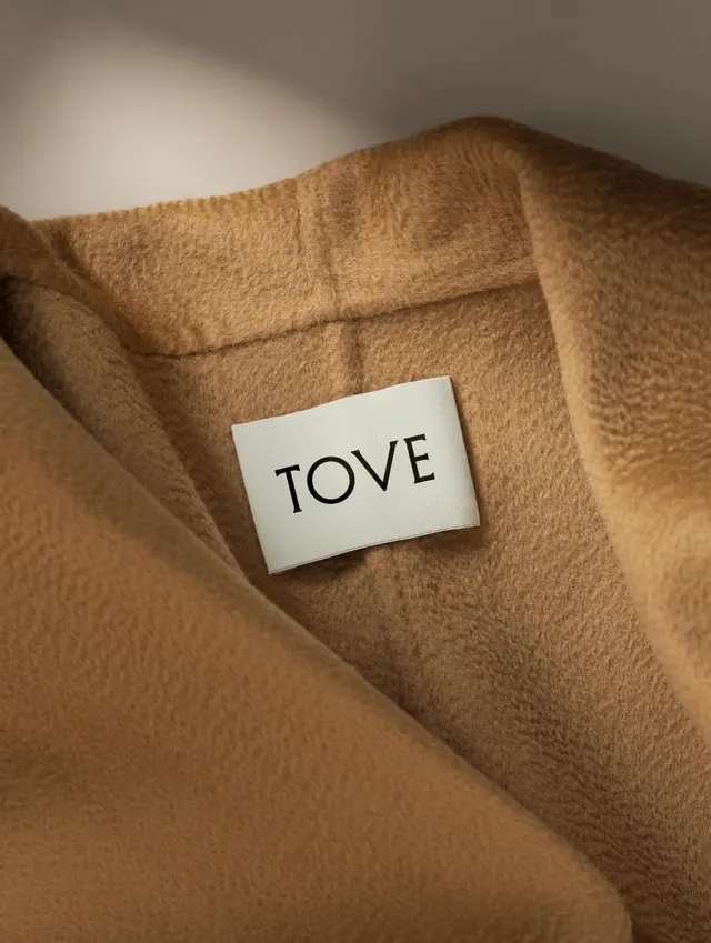 Tove brand identity system carousel with fashion and collateral (slide 8)