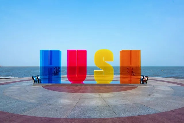HUSH translucent letter installation, minimal, playful, vibrant