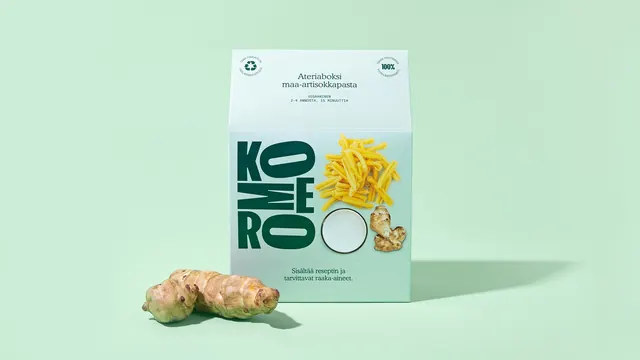 Komero meal-kit box with cut-out ingredient photography, minimal, photographic, light