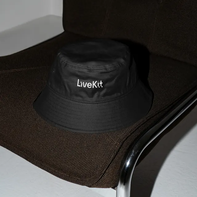 LiveKit branded bucket hat, minimal, photographic, dark