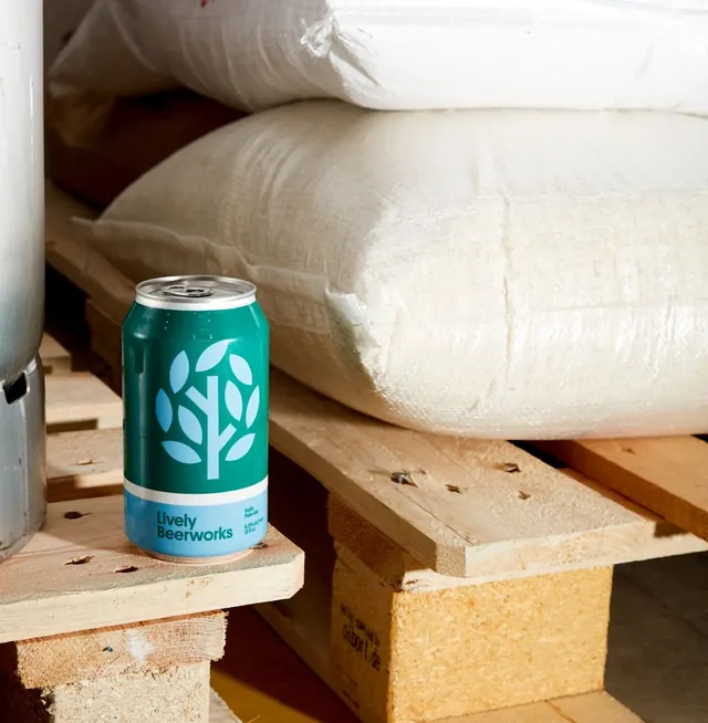 Lively Beerworks IPA can in the brewery, minimal, flat, cool