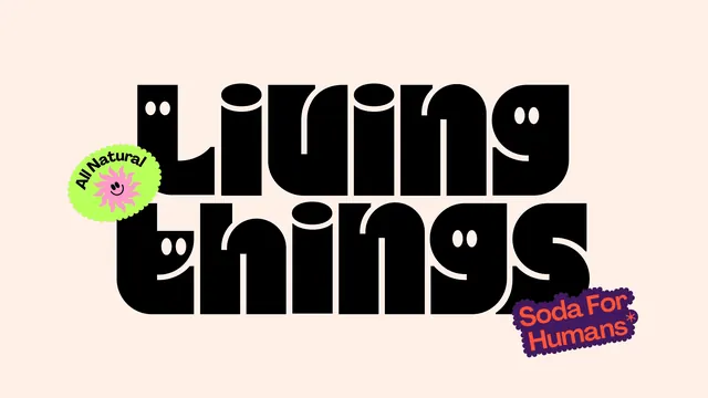 Living Things smiling wordmark lockup, playful, typographic, light