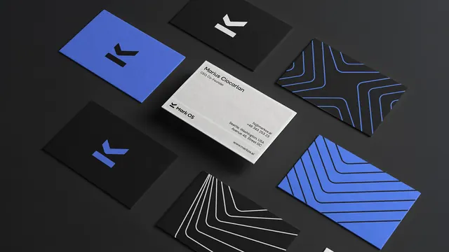 Mark OS business card flat lay on black, photographic, minimal, dark