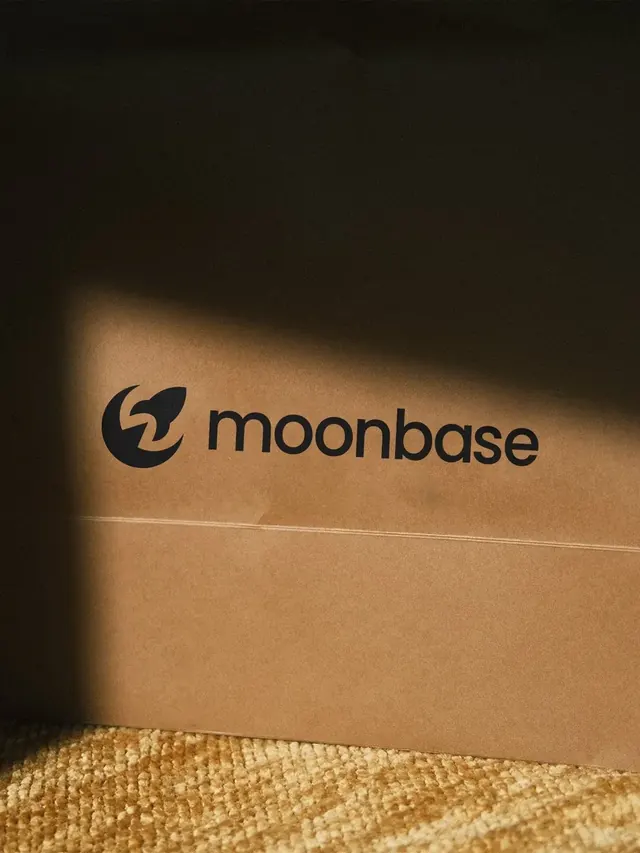 Moonbase logo, geometric, minimal, dark