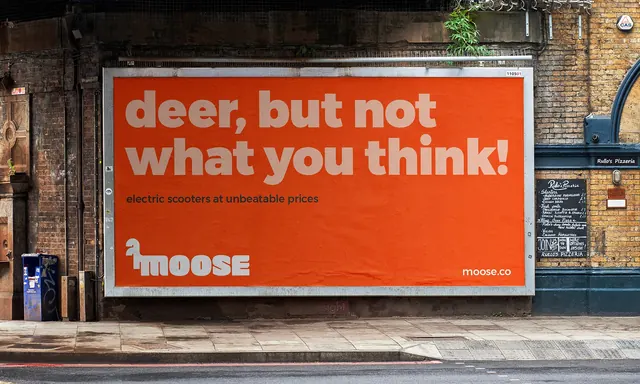Moose billboard with oversized punchline headline, typographic, playful, vibrant