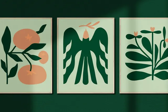 Myrth cut-paper prints framed on a green wall, illustrated, organic, earthy