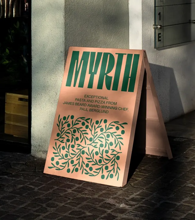 Myrth painted A-frame sidewalk sign, typographic, illustrated, warm