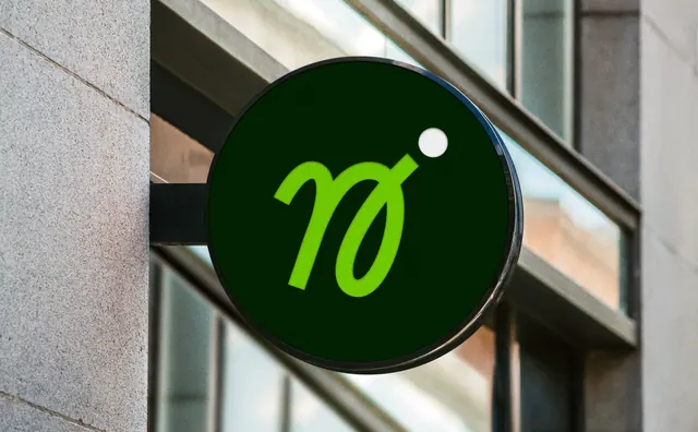 Naolib monogram on a circular blade sign, minimal, photographic, dark