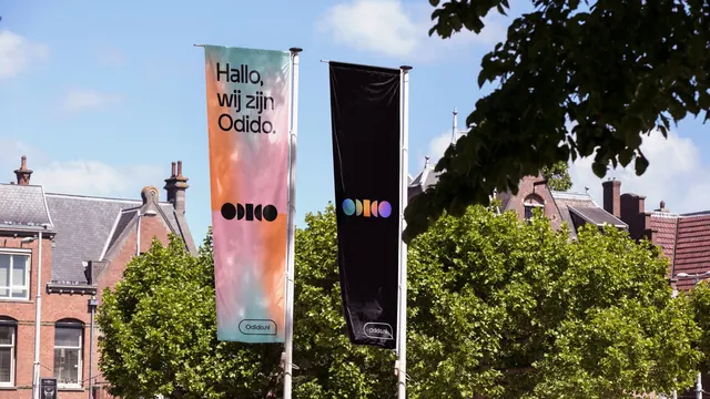 Odido street flags in gradient and black, photographic, gradient-heavy, vibrant