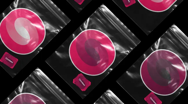 Omnisea zip bags with oversized magenta sticker, photographic, geometric, dark