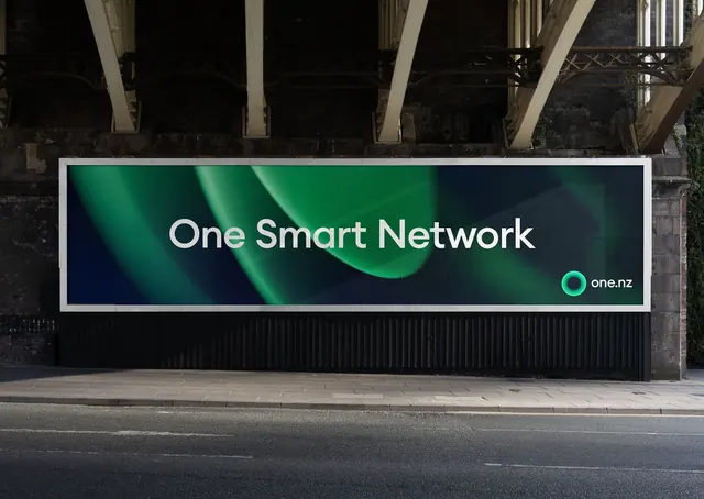 One New Zealand billboard under a rail bridge, minimal, dark-mode, dark
