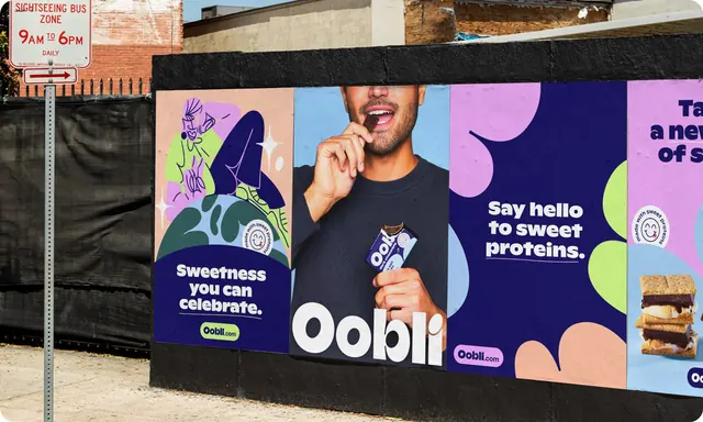 Oobli poster series pasted on a street hoarding, photographic, illustrated, vibrant