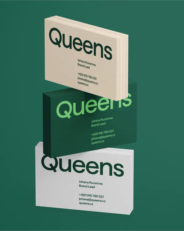 Queens business cards floating in three colorways, minimal, geometric, dark