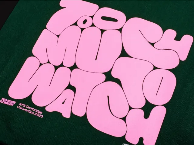 Pink bubble lettering printed on dark green canvas, typographic, playful, dark