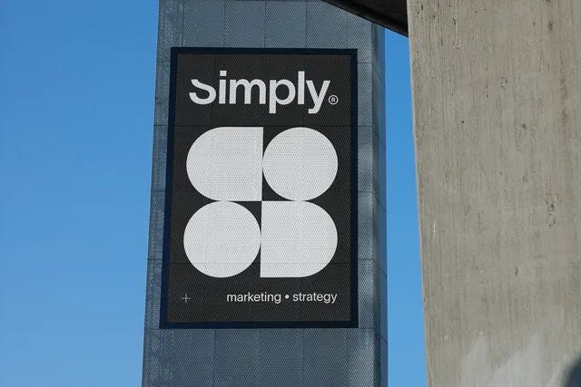 Simply symbol poster on a metal-clad column, minimal, geometric, dark