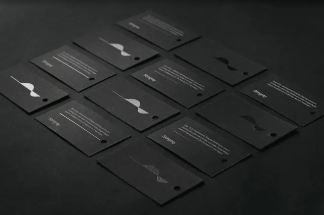 Stingray black-on-black swing tags, minimal, monochrome, dark