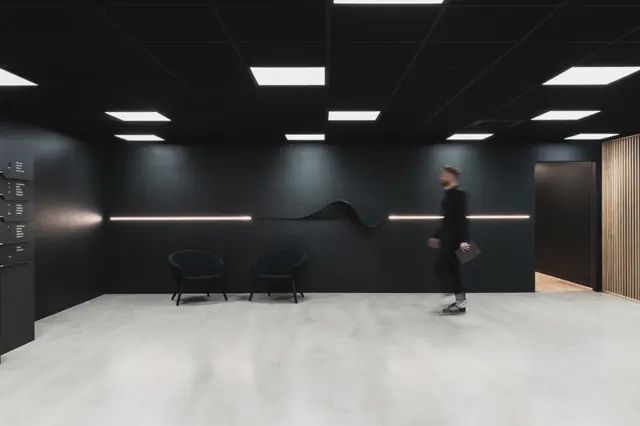Stingray reception with wave relief, minimal, architectural, dark