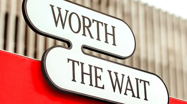 Worth the Wait' fabricated pill sign, minimal, typographic, high-contrast