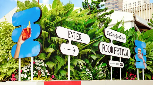 Food festival entrance sign cluster, photographic, editorial, vibrant