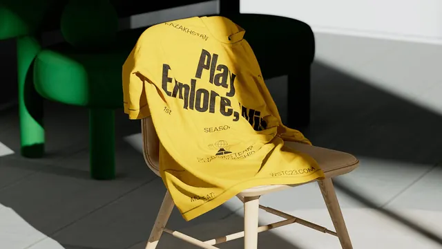 WSTC 2023 printed t-shirt on a chair, photographic, minimal, vibrant