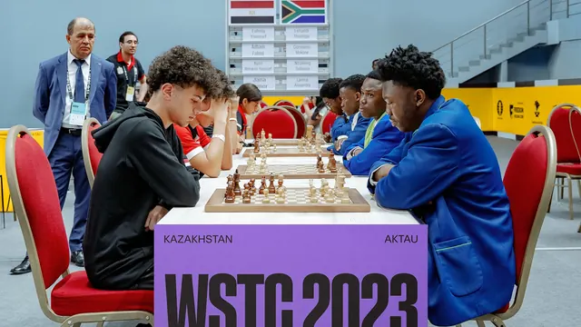 WSTC 2023 tournament hall with purple caption block, photographic, editorial, vibrant