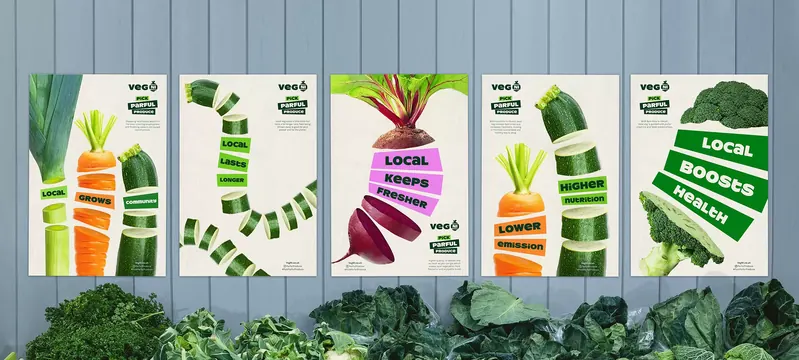 Veg NI poster run above a market veg display, photographic, playful, vibrant