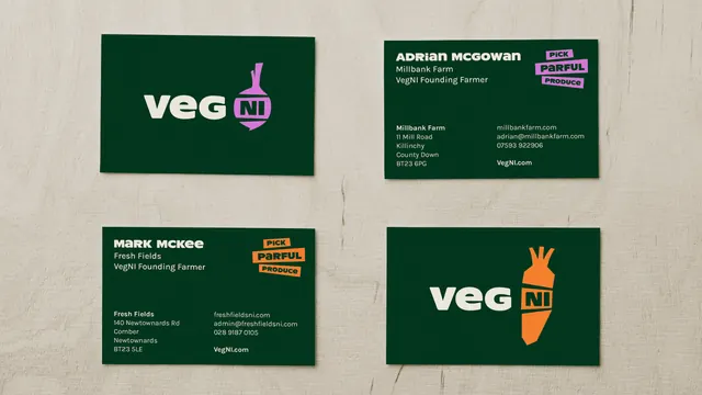 Veg NI farmer business cards on pale wood, flat, minimal, dark