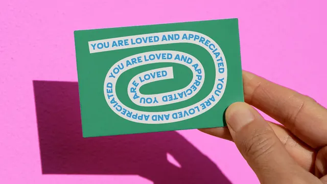 West Loop spiral message card in hand, flat, typographic, vibrant