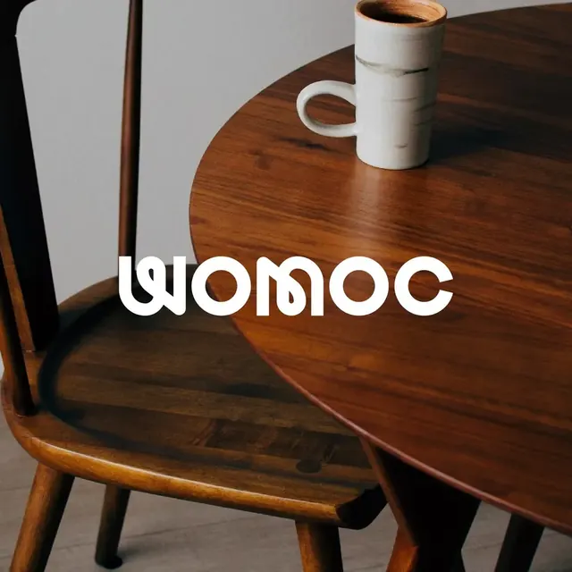 Womoc logo, minimal, light