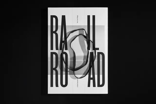 Railroad typographic book cover with ribbon, minimal, swiss, monochrome