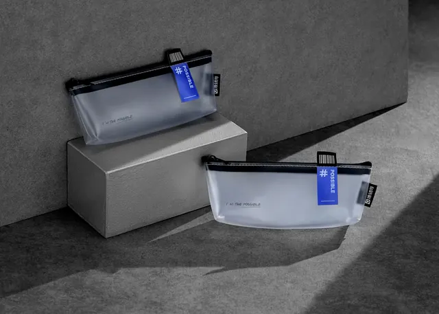 Translucent POSSIBLE pouches on plinth, minimal, corporate-clean, cool