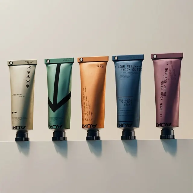 AUKI metallic tube lineup, minimal, swiss, muted