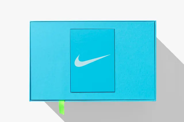 Nike React cyan packaging with white swoosh, minimal, photographic, vibrant
