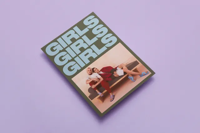 Magazine cover with oversized bold typography, bold, display, muted