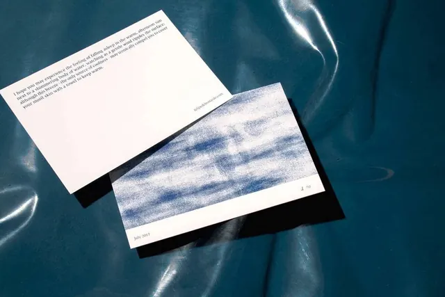 Minimalist print publication with blue texture, editorial, minimal, light
