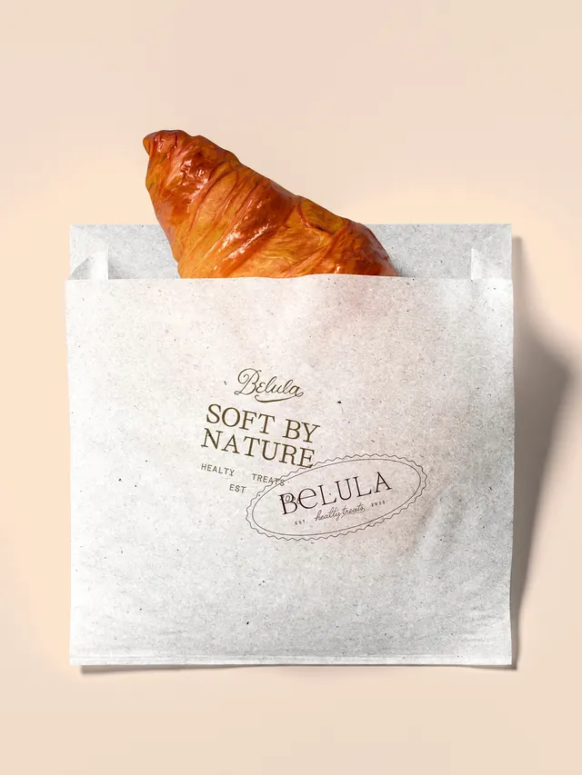 BeLULA product styling carousel with utensils and natural elements (slide 5)