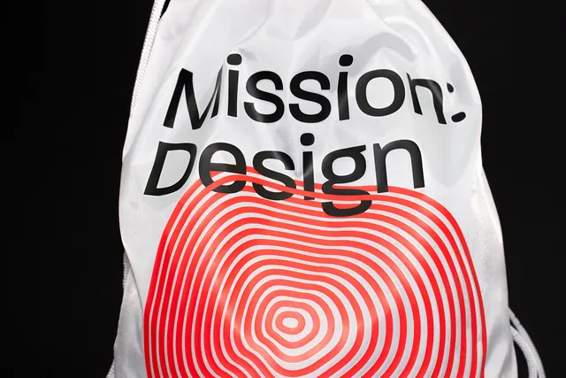 Event poster with 'Mission: Design' text and concentric circles, geometric, technical, high-contrast