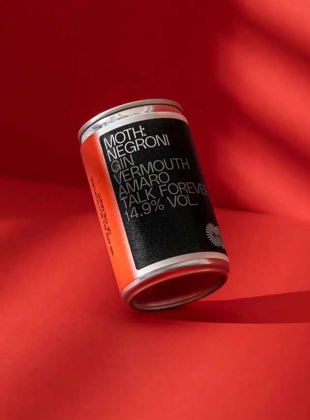 Negroni cocktail product packaging, product-showcase, minimal, dark