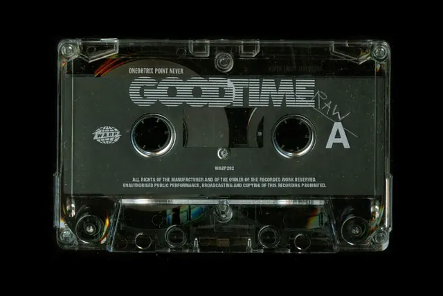 Good Time clear cassette with striped type, brutalist, minimal, dark