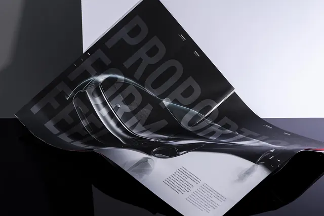 Curved automotive brochure with proportion type, minimal, editorial, dark