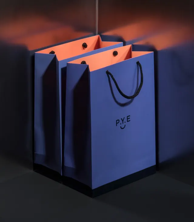P.Y.E shopping bag packaging study, minimal, boxed, dark