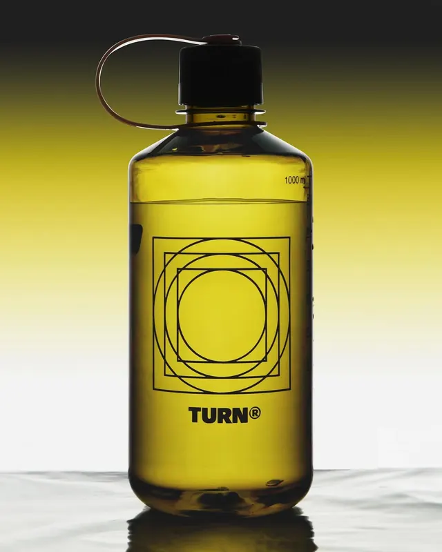 TURN branded oil bottle, minimal, geometric, warm