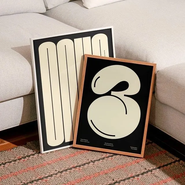 Framed bold geometric typography and mark posters, minimal, geometric, dark