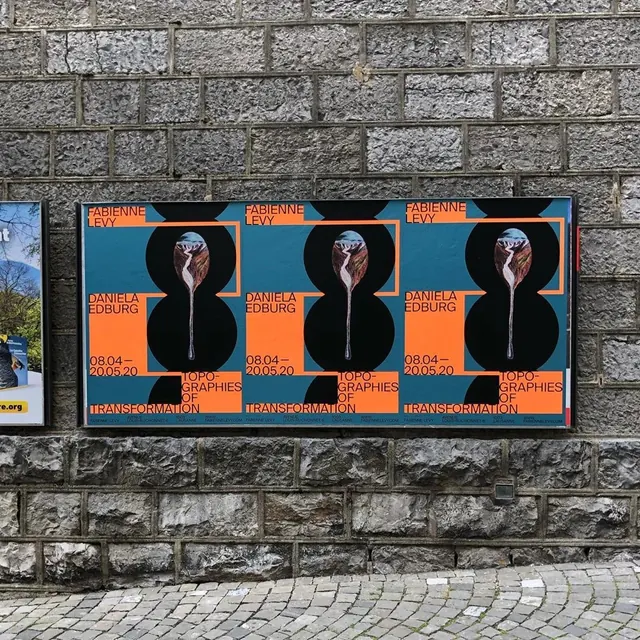 Typography poster trio on street wall, editorial, bold, vibrant