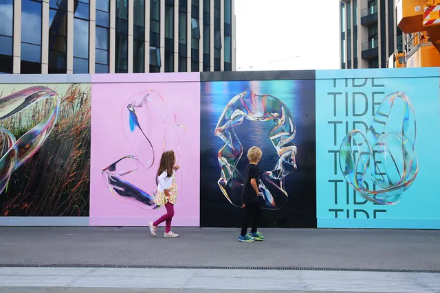 The Tide mural with neon-styled typography, gradient-heavy, abstract, vibrant