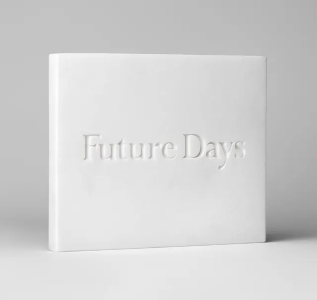 Future Days white embossed box, minimal, corporate-clean, light