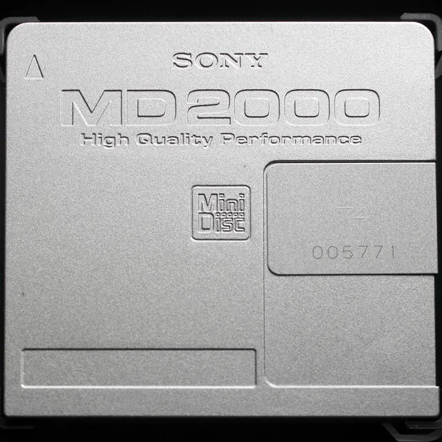 Sony MD2000 MiniDisc packaging mockup, minimal, monochrome, light